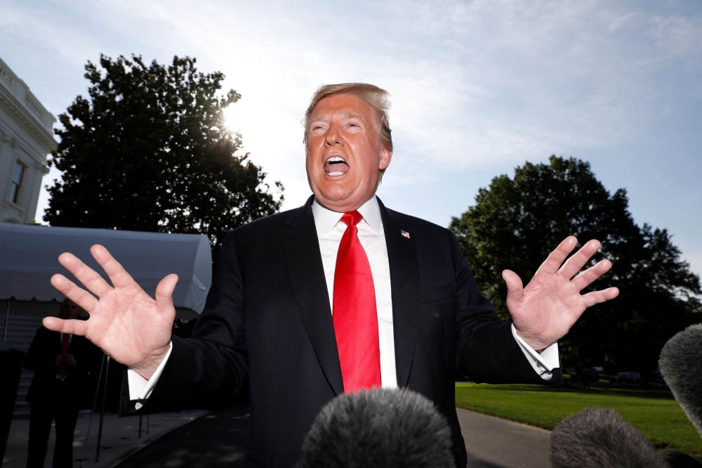 U.S. President Donald Trump speaks to the news media as he departs for travel to Colorado from the White House in Washington, U.S., May 30, 2019. REUTERS/Kevin Lamarque