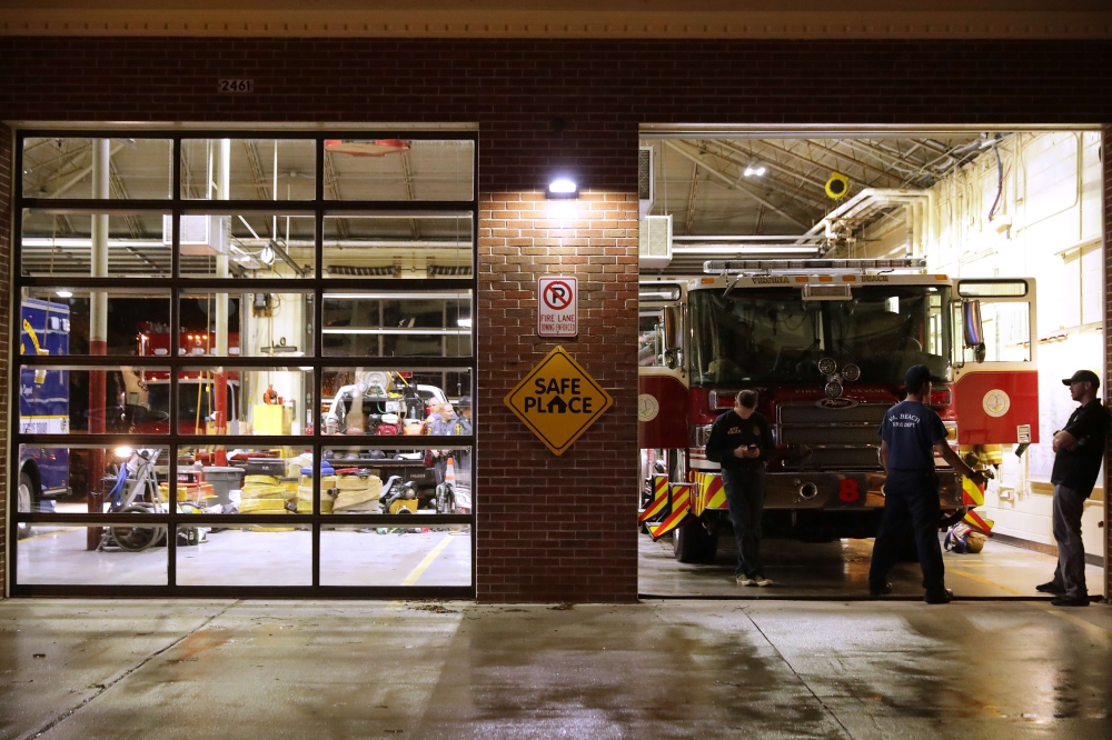 Emergency workers stand by at Virginia Beach Fire and EMS Station 5 inside the Municipal Center following a deadly mass shooting May 31, 2019 in Virginia Beach, Virginia. Chip Somodevilla/Getty Images/AFP == 