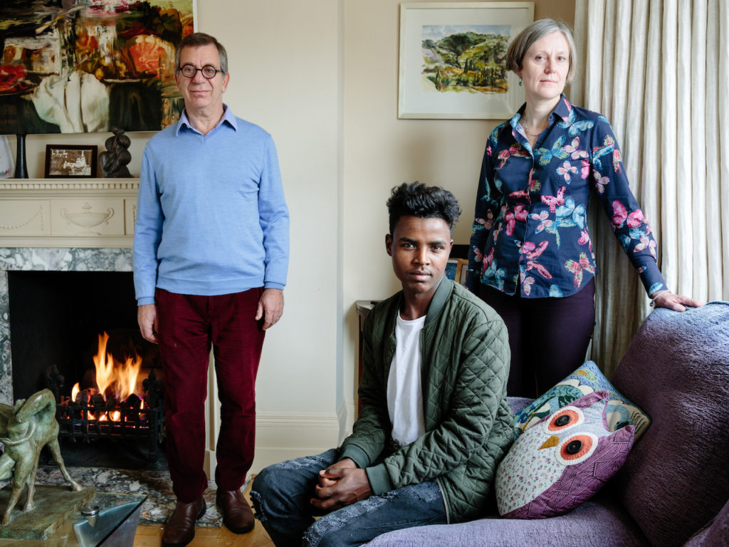 The law allows authorities to keep rejected asylum seekers facing deportation in regular prisons but separated from the prisoners. This file photo shows two german citizens, Charles Elliott and wife Catharine, who have been hosting, Hussein, 20, from Ethi
