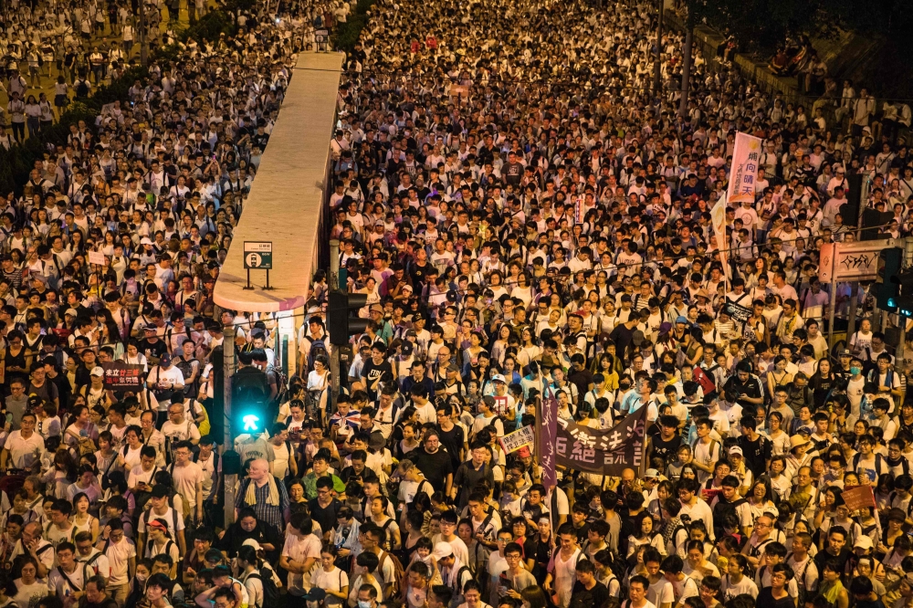 Protesters attend a rally against a controversial extradition law proposal in Hong Kong on June 9, 2019.   AFP / DALE DE LA REY