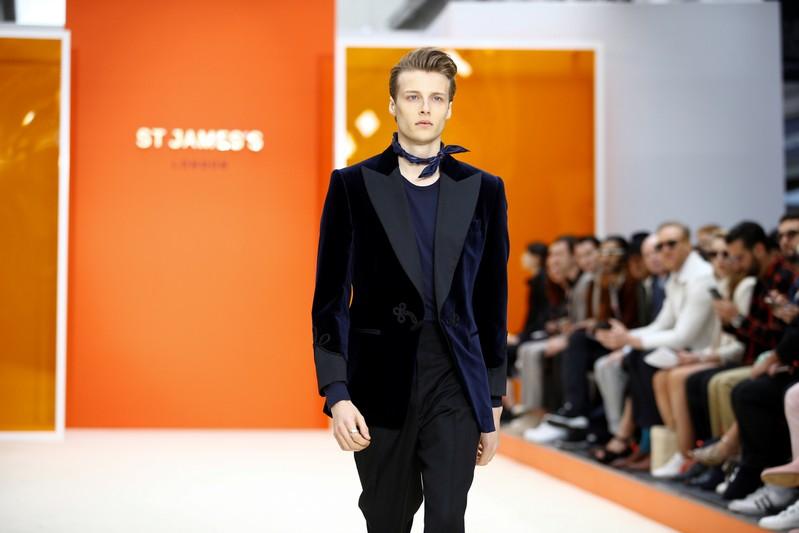 A model presents a creation during the St James catwalk show at London Fashion Week Men's in London, Britain, June 8, 2019. REUTERS/Henry Nicholls
