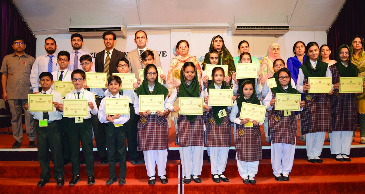 PISQ principal, teachers and winning students after the Spelling Bee Competition 2019.