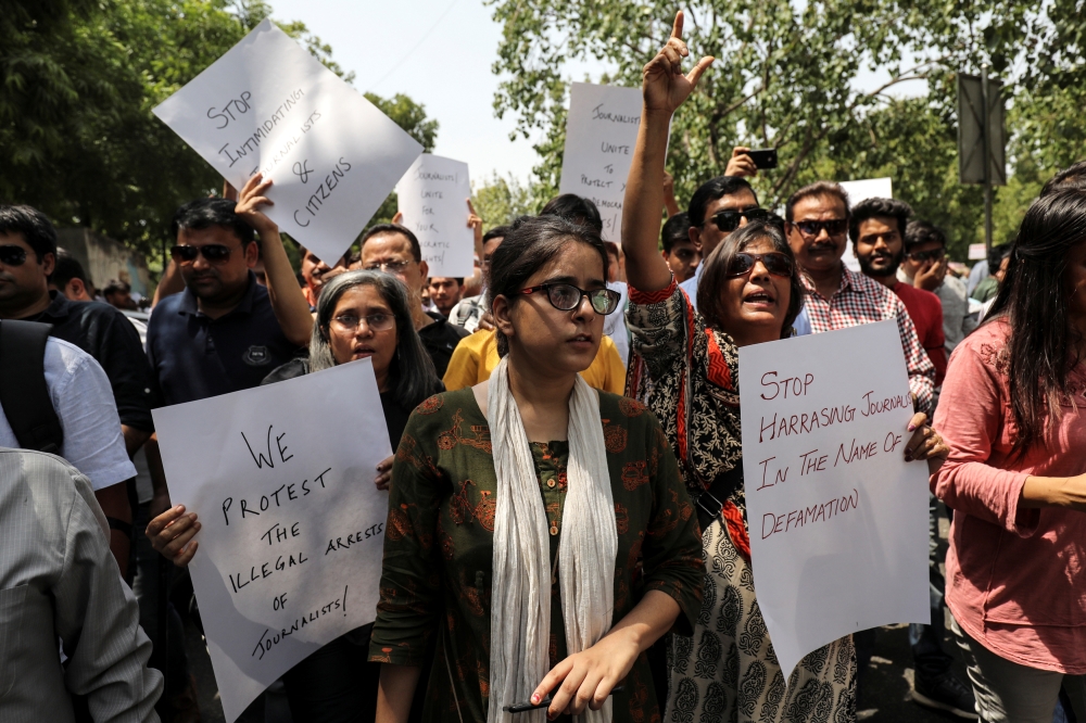 Jagisha Arora, wife of Prashant Kanojia, a journalist who was arrested for allegedly tweeting defamatory content against Uttar Pradesh's Chief Minister Yogi Adityanath, takes part in a protest with media members in New Delhi, India June 10, 2019. Reuters/