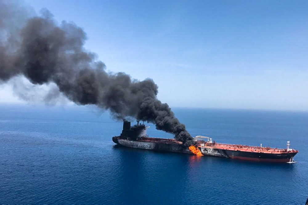 An oil tanker is seen after it was attacked at the Gulf of Oman, June 13, 2019. 