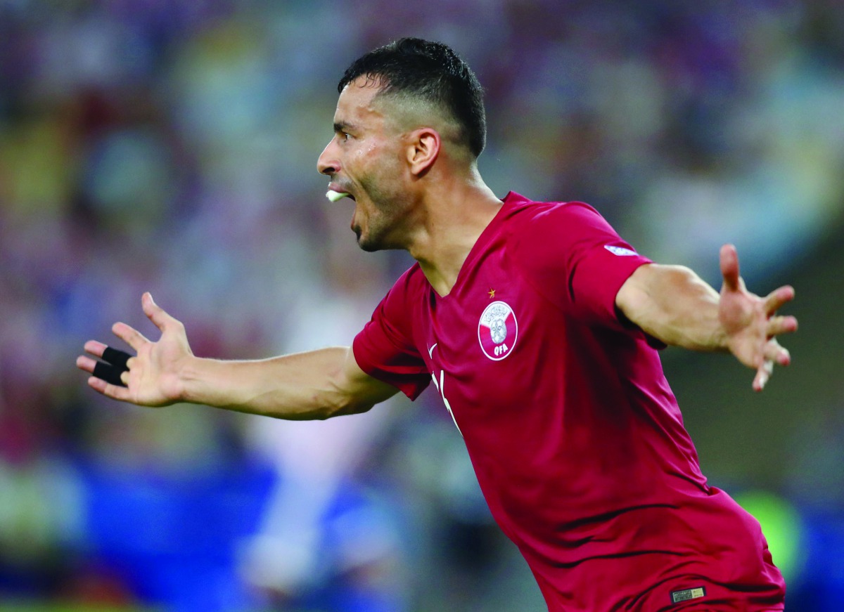 Qatar’s Bualem Khoukhi celebrates scoring their second goal during their Copa America match against Paraguay at the Maracana Stadium, Rio de Janeiro, Brazil, yesterday.