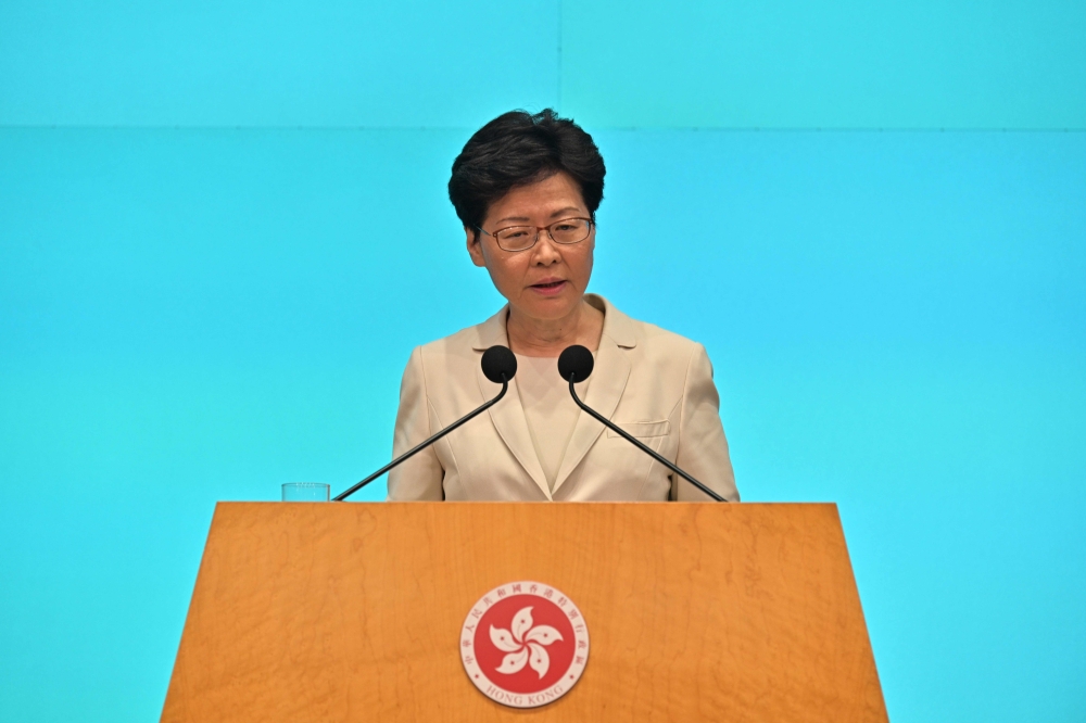 Hong Kong Chief Executive Carrie Lam speaks during a press conference at the government headquarters in Hong Kong on June 18, 2019. AFP / Anthony Wallace 
