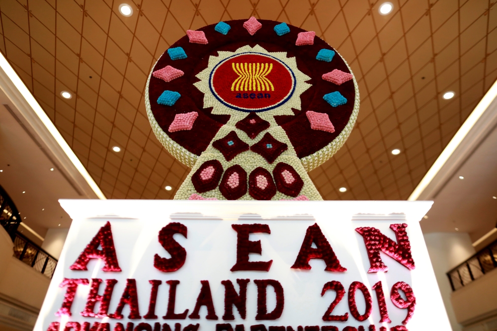 The ASEAN logo, made out of flowers, is seen before the 34th ASEAN Summit takes place, in Bangkok, Thailand June 19, 2019. REUTERS/Soe Zeya Tun
 