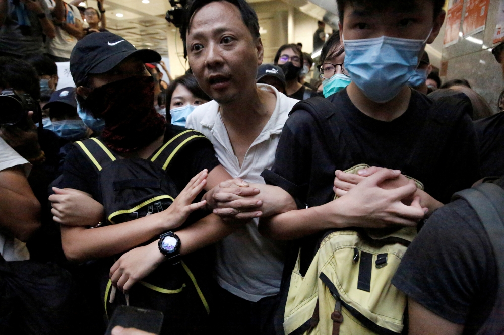 Anti-extradition bill protesters occupy the Revenue Tower in Hong Kong, China, June 24, 2019. REUTERS/Ann Wang