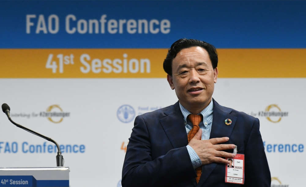 Newly-appointed FAO Director-Feneral, China's Qu Dongyu acknowledges applause following the vote on June 23, 2019 during the FAO 41st Conference at the Food and Agriculture Organization of the United Nations (FAO) headquarters in Rome. AFP / Vincenzo Pint