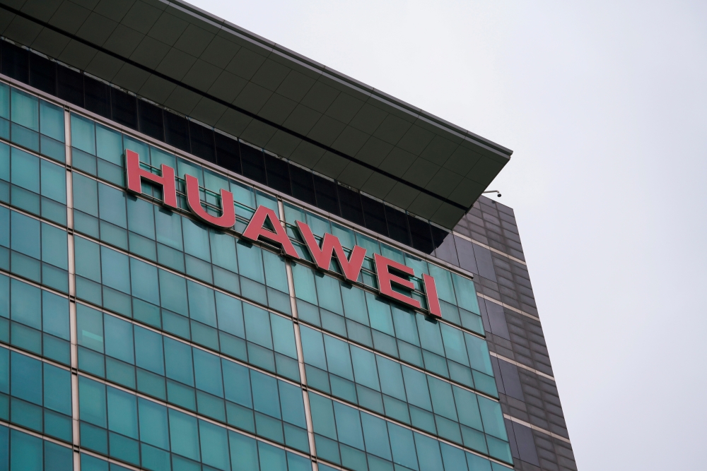 FILE PHOTO: A Huawei company logo is seen at the company headquarters in Shenzhen, Guangdong province, China June 17, 2019. REUTERS/Aly Song
