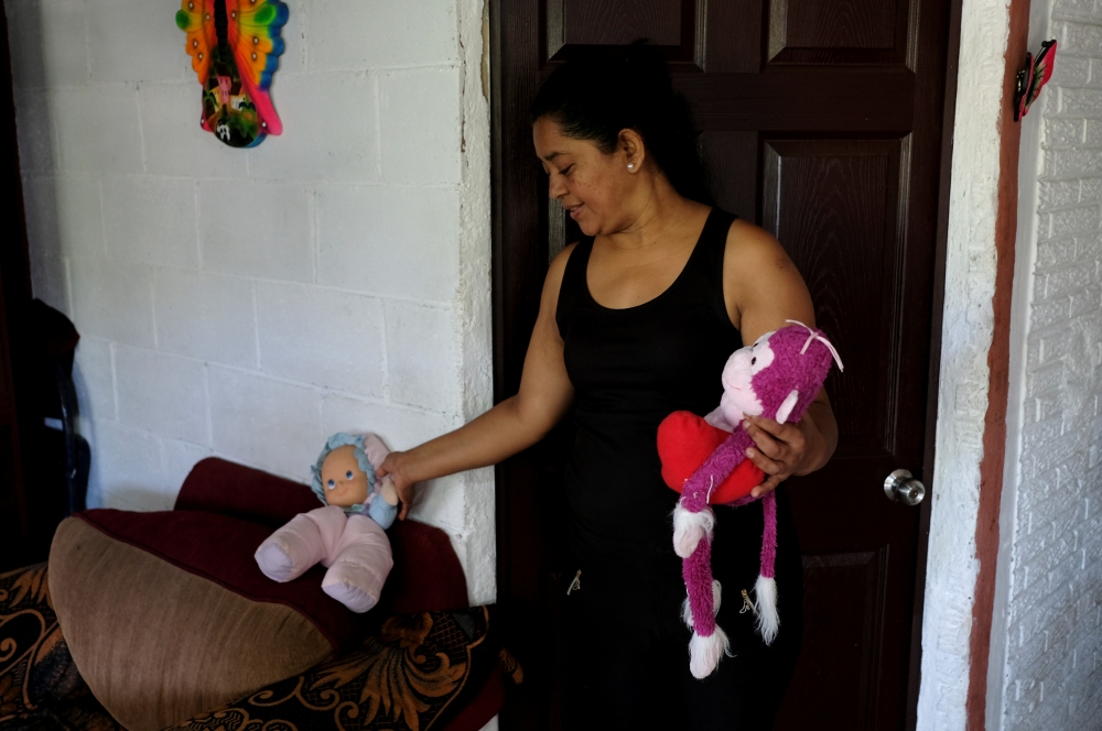 Rosa Ramirez, mother of Oscar Alberto Martinez Ramirez, a migrant who drowned in the Rio Grande River with his daughter Valeria during their journey to the U.S., is pictured at her house in the Altavista neighbourhood in San Martin, El Salvador June 26, 2