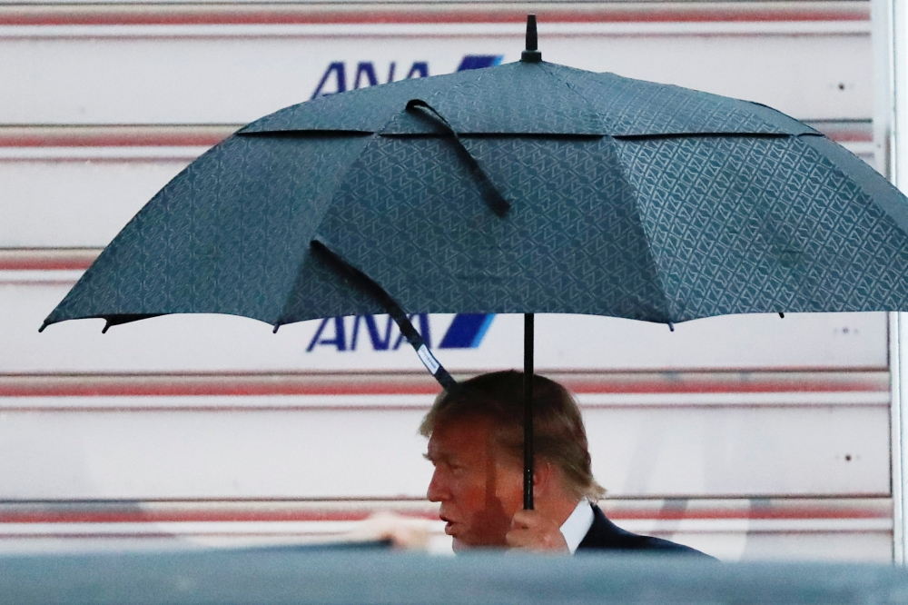 U.S. President Donald Trump arrives ahead of the G20 leaders summit in Osaka International Airport in Toyonaka, Osaka prefecture, Japan June 27, 2019. REUTERS/Issei Kato