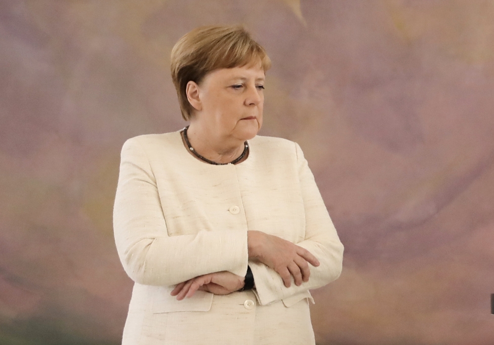 German Chancellor Angela Merkel attends a ceremony where the country's new Justice Minister was given her certificate of appointment by the German President at the presidential Bellevue Palace in Berlin on June 27, 2019. AFP / Kay Nietfeld
