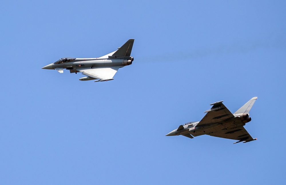 Two Eurofighter Typhoon planes are pictured during a training flight ahead of the F1 Grand Prix of Austria at Red Bull Ring on June 27, 2019 in Spielberg, Austria. AFP / GEORG HOCHMUTH
