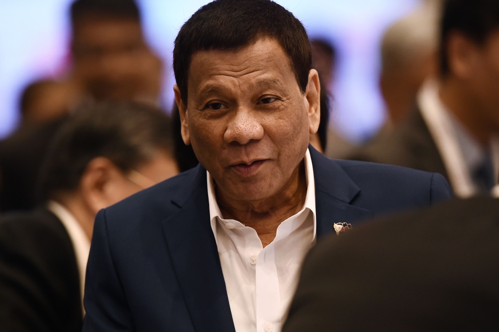 Philippines' President Rodrigo Duterte attends the plenary session of the 34th Association of Southeast Asian Nations (ASEAN) Summit in Bangkok on June 22, 2019. / AFP / Lillian SUWANRUMPHA 