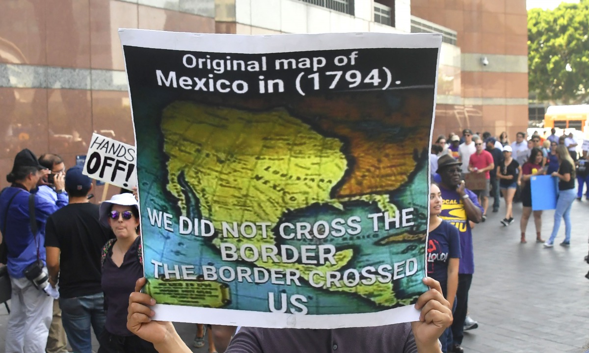 A map of Mexico as it was in 1794 is displayed as young immigrants and their supporters rally in support of DACA in Los Angeles, California on September 1, 2017. AFP/Frederic J Brown