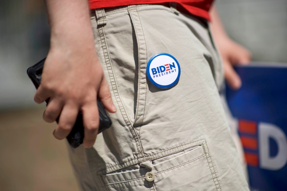 A supporter wears a pin on his shorts reading BIDEN PRESIDENT after Democratic 2020 presidential candidate Joe Biden held a campaign rally in Philadelphia, May 18, 2019. Reuters/Mark Makela
 