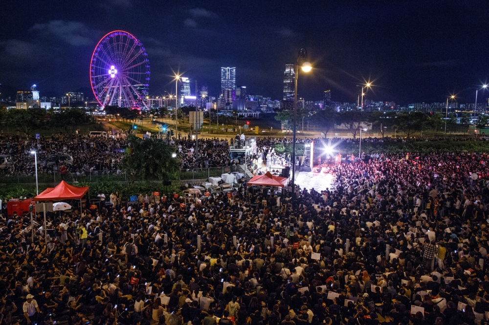 Demonstrators attend a rally ahead of the G20 summit, urging the international community to back their demands for the government to withdraw a the extradition bill in Hong Kong, China June 26, 2019. REUTERS/Thomas Peter
