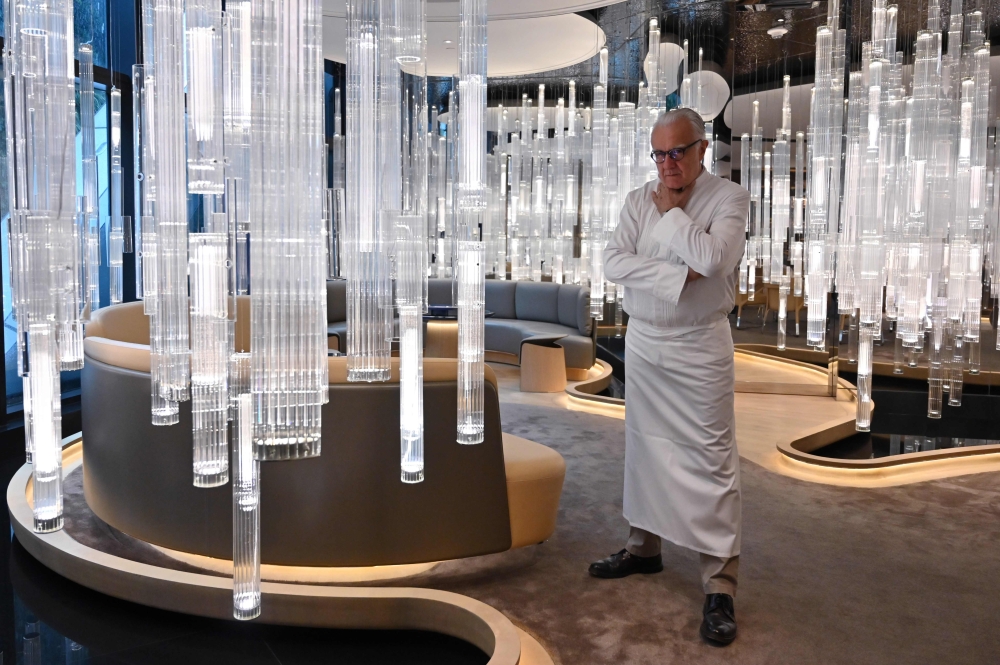 Chef Alain Ducasse posing for a picture at his restaurant Alain Ducasse at the Morpheus hotel in Macau.( AFP / Hector RETAMAL)