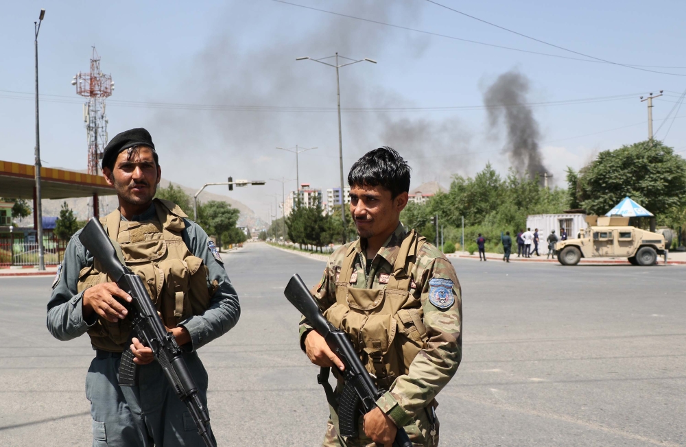Afghan security officials secure the scene of a suicide bombing in Kabul, Afghanistan, July 01, 2019. (Haroon Sabawoon - Anadolu Agency)