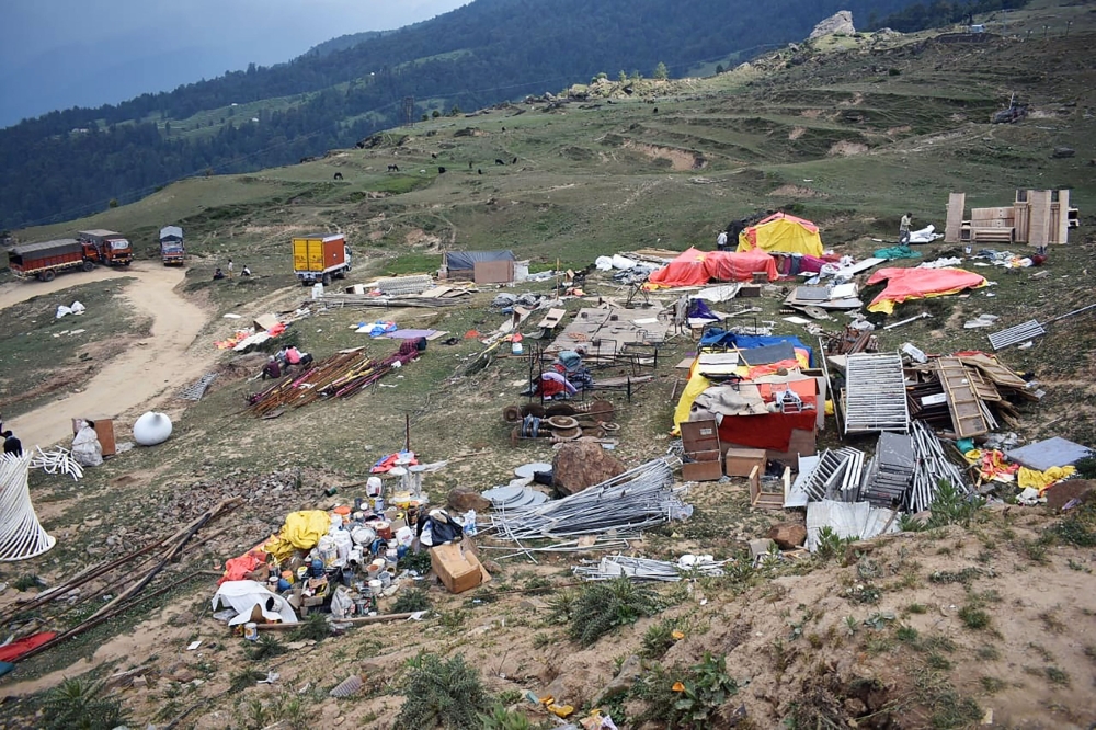 This file photo taken on June 24, 2019 shows waste left behind following the large-scale weddings of the brothers Suryakant and Shashank Gupta of the South Africa-based Gupta family in the Auli hill station in Uttarakhand state.  / AFP / STR 