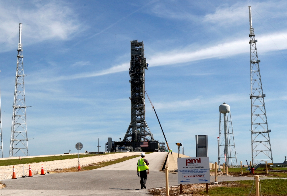 NASA's Space Launch System mobile launcher stands atop Launch Pad 39B for months of testing before it will launch the SLS rocket and Orion spacecraft on mission Artemis 1 at the Kennedy Space Center in Cape Canaveral, Florida, U.S., July 1, 2019. REUTERS/
