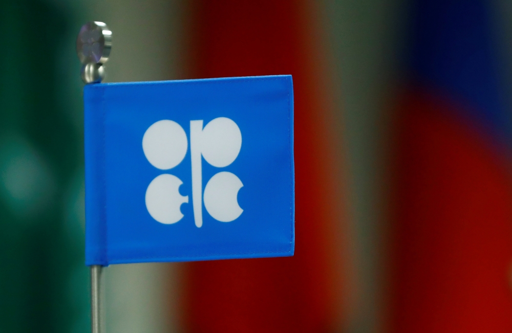 FILE PHOTO: A flag with the OPEC logo is seen during a meeting of OPEC and non-OPEC producing countries in Vienna, September 22, 2017. Reuters/Leonhard Foeger