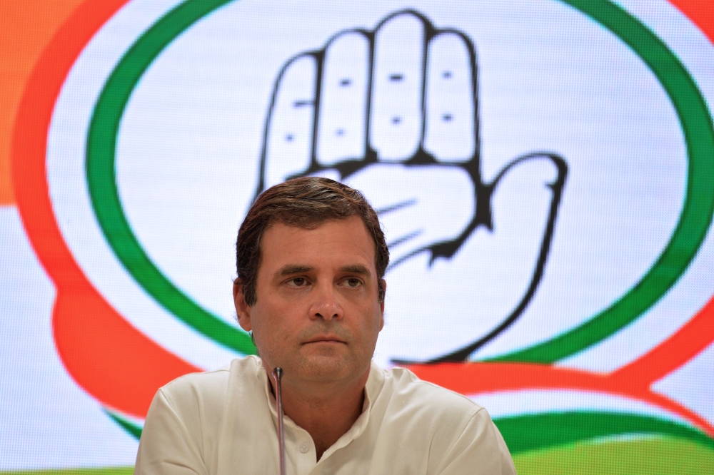 In this file photo taken on May 23, 2019 Indian National Congress Party president Rahul Gandhi looks on during a press conference in New Delhi. / AFP / SAJJAD HUSSAIN 