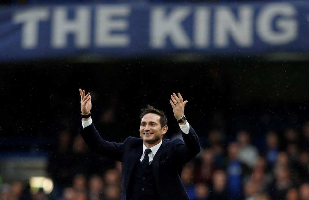 (FILES) In this file photo taken on February 25, 2017, Chelsea and England former football player Frank Lampard gestures to the fans on the pitch at half-time during the English Premier League football match between Chelsea and Swansea at Stamford Bridge 