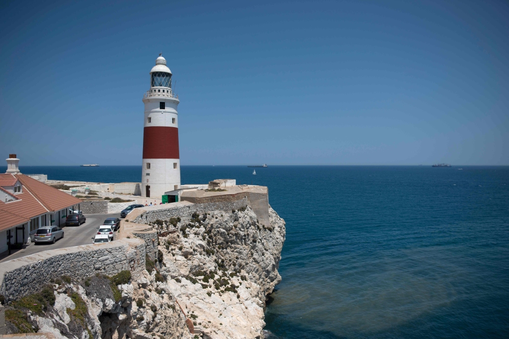 A picture shows supertanker Grace 1 (rear C) suspected of carrying crude oil to Syria in violation of EU sanctions after it was detained off the coast of Gibraltar on July 4, 2019.  AFP / Jorge Guerrero 