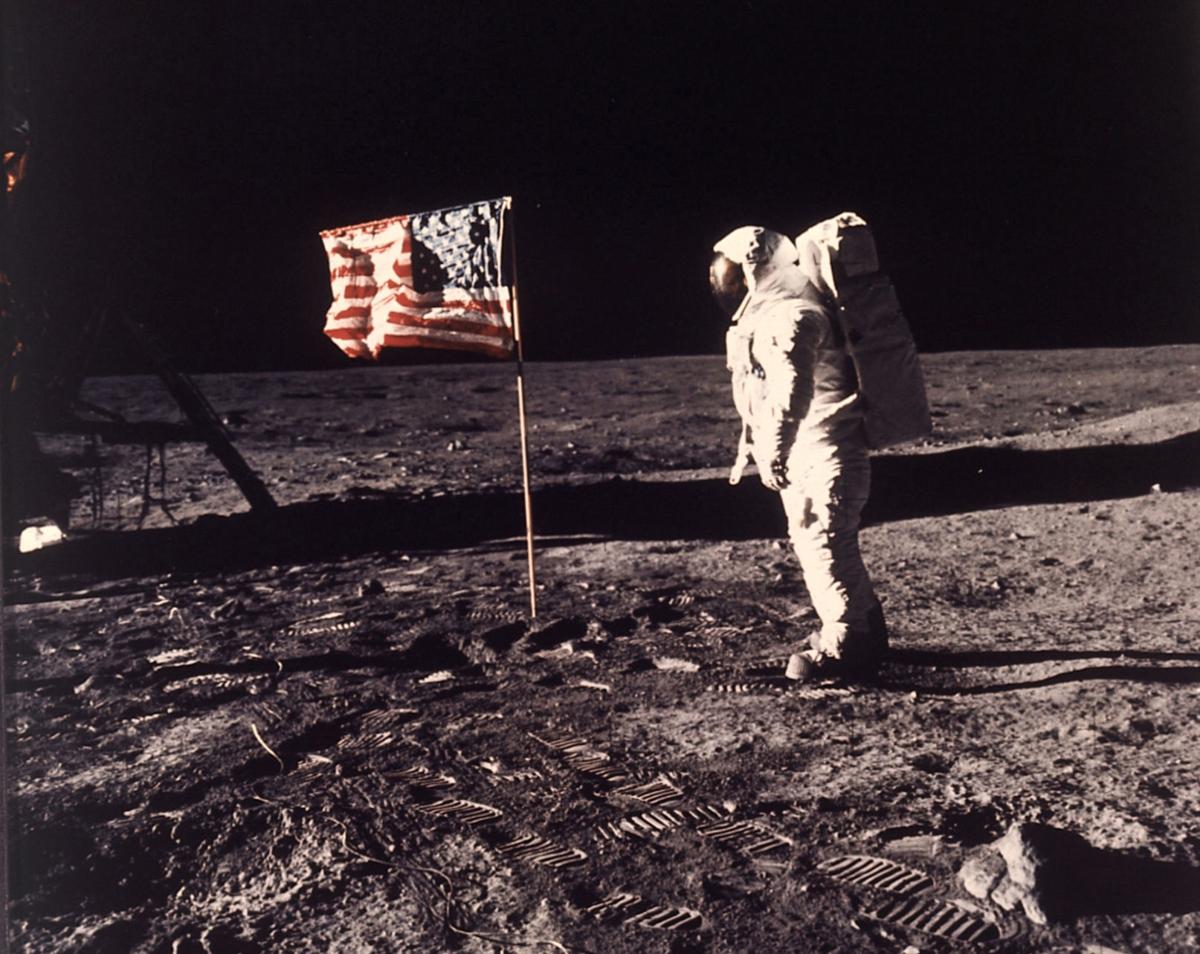 FILE:  In this image provided by NASA, astronaut Buzz Aldrin poses for a photograph beside the U.S. flag deployed on the moon during the Apollo 11 mission on July 20, 1969. Television is marking the 50th anniversary of the July 20, 1969, moon landing with