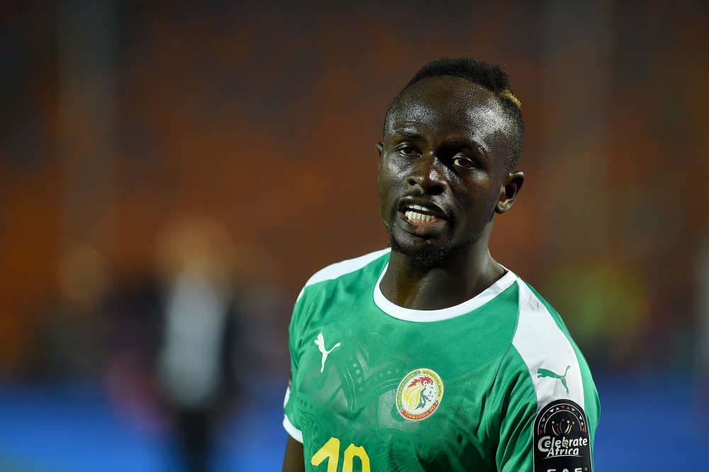 Senegal's forward Sadio Mane looks on after scoring a goal during the 2019 Africa Cup of Nations (CAN) Round of 16 football match between Uganda and Senegal at the Cairo International Stadium in the Egyptian capital on July 5, 2019. / AFP / MOHAMED EL-SHA