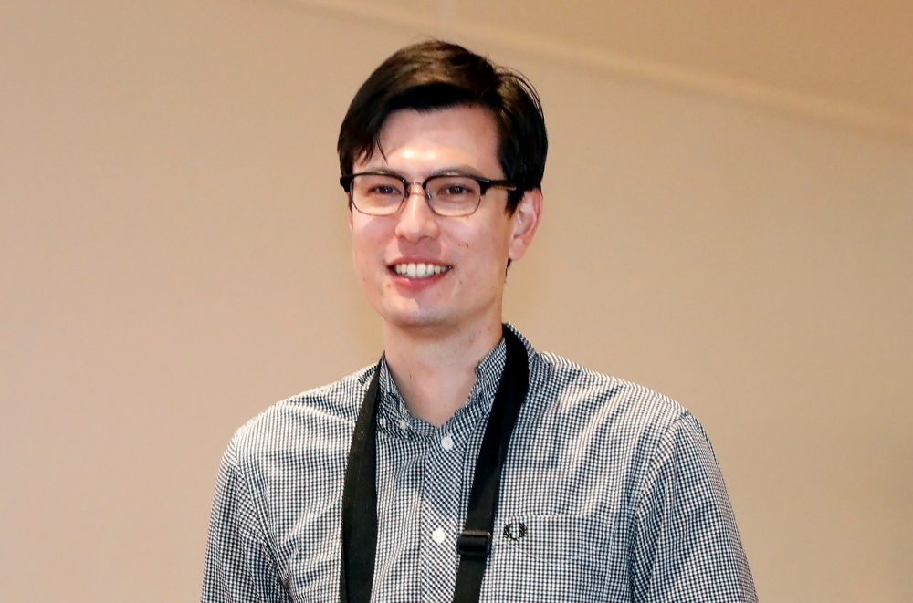 Australian student Alek Sigley, 29, who was detained in North Korea, arrives at Haneda International Airport in Tokyo, Japan July 4, 2019. Reuters/Issei Kato