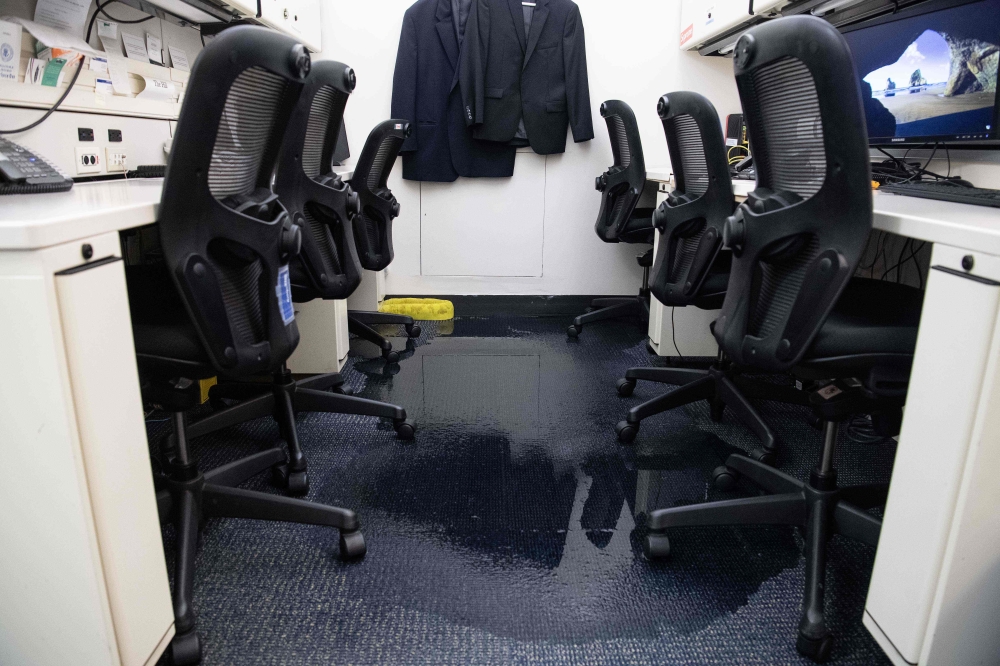 Flooding is seen in the basement of the White House briefing room in Washington, DC, on July 8, 2019, as widespread dangerous flash flooding was occurring throughout the DC metro area, including in downtown Washington DC. AFP / NICHOLAS KAMM