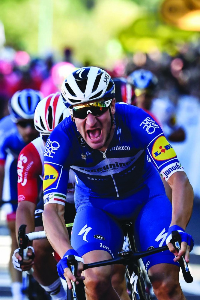 Italy's Elia Viviani reacts as he crosses the finish line at the end of the fourth stage of the 106th edition of the Tour de France cycling race between Reims and Nancy, in Nancy, eastern France, on July 9, 2019. AFP / Jeff Pachoud
