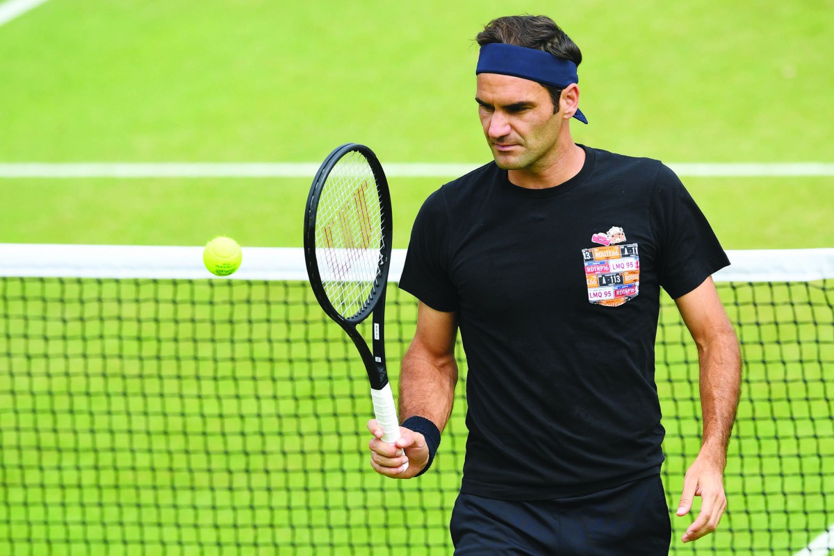 Switzerland's Roger Federer attends a training session on day eight of the 2019 Wimbledon Championships at The All England Lawn Tennis Club in Wimbledon, southwest London, on July 9, 2019. AFP / Ben Stansall