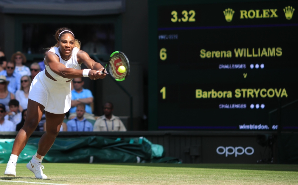 US player Serena Williams returns against Czech Republic's Barbora Strycova during their women's singles semi-final match on day ten of the 2019 Wimbledon Championships at The All England Lawn Tennis Club in Wimbledon, southwest London, on July 11, 2019. 