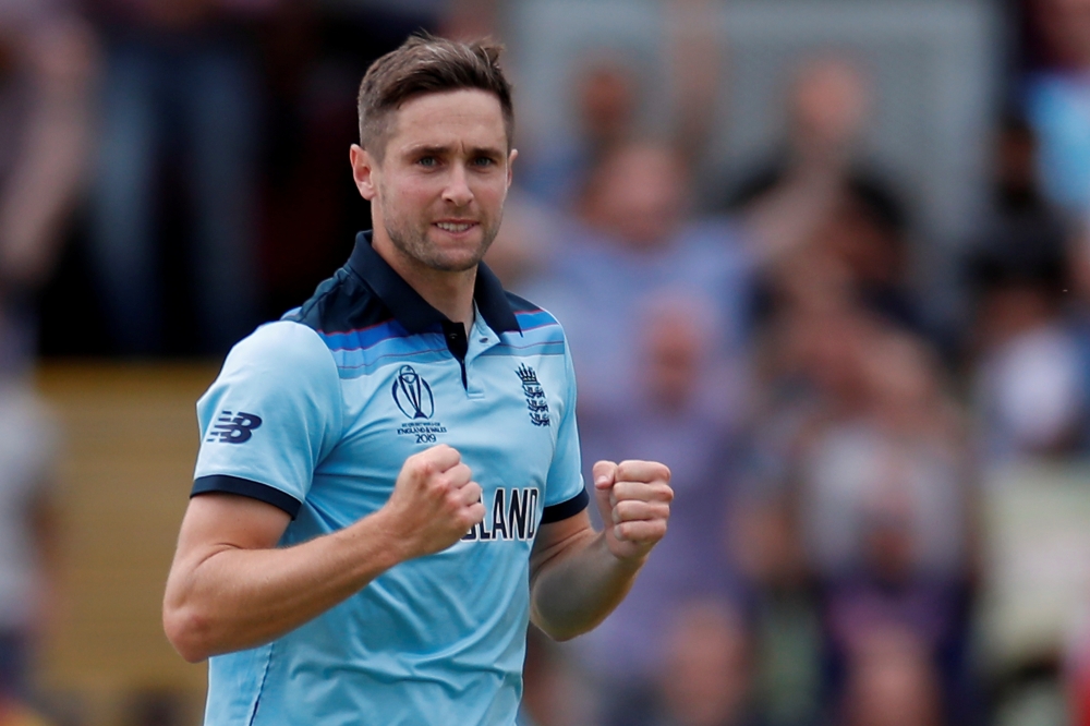 England's Chris Woakes celebrates taking the wicket of Australia's Mitchell Starc Action Images via Reuters/Paul Childs