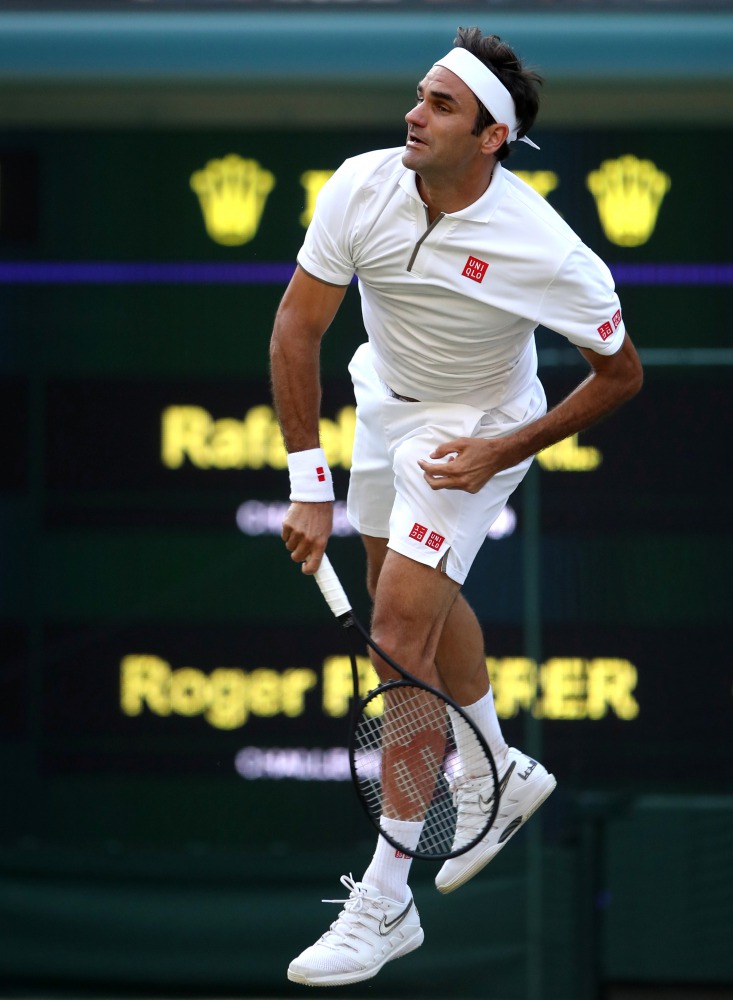 Switzerland’s Roger Federer in action during his Wimbledon men’s singles semi-final match against Spain’s Rafael Nadal at the All England Lawn Tennis and Croquet Club in London, Britain, yesterday. 