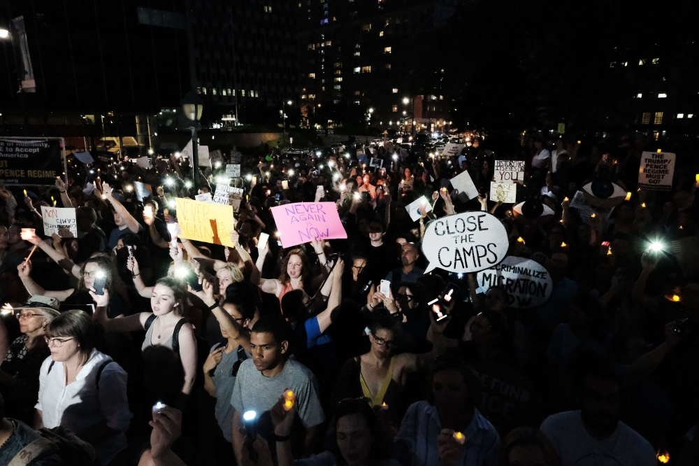 Hundreds of people gather in lower Manhattan for a 