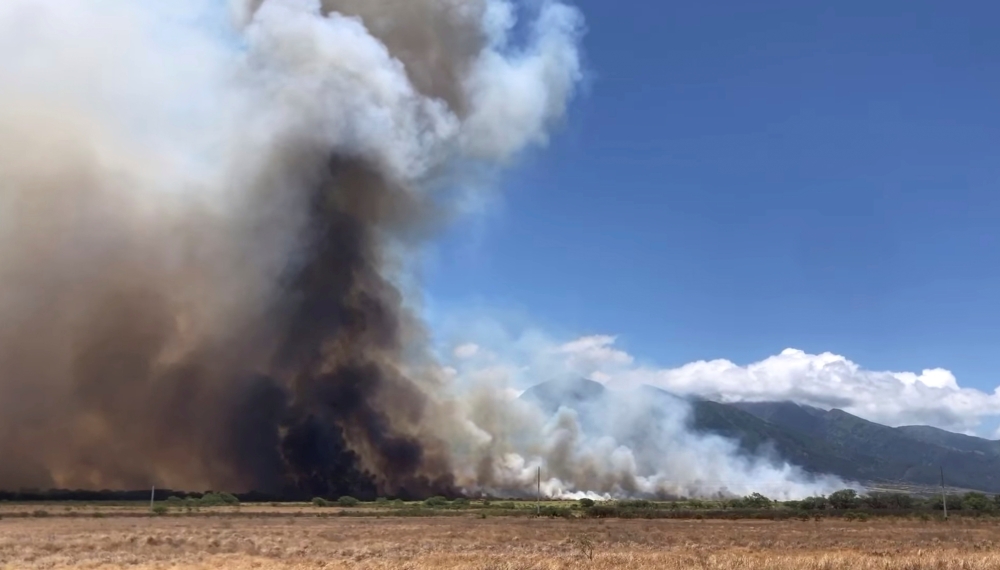 A wildfire is seen on the island of Maui, Hawaii, U.S., July 11, 2019 in this video grab taken from social media, July 12, 2019. John Sandbach Photography/Instagram@sandbachspics via REUTERS