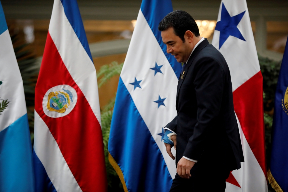 Guatemala's President Jimmy Morales is seen before a family photo during a meeting of the Central American Integration System (SICA), in Guatemala City, Guatemala June 5, 2019. Reuters/Luis Echeverria