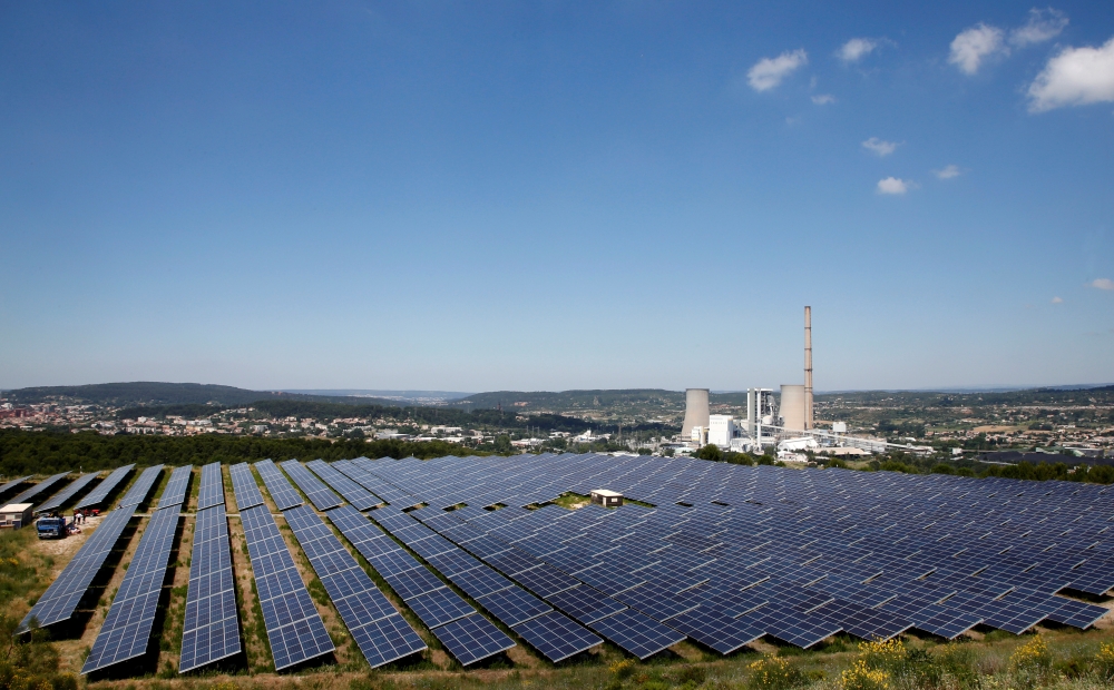 A general view shows solar panels to produce renewable energy at the Urbasolar photovoltaic park in Gardanne, France, June 25, 2018. Reuters / Jean-Paul Pelissier