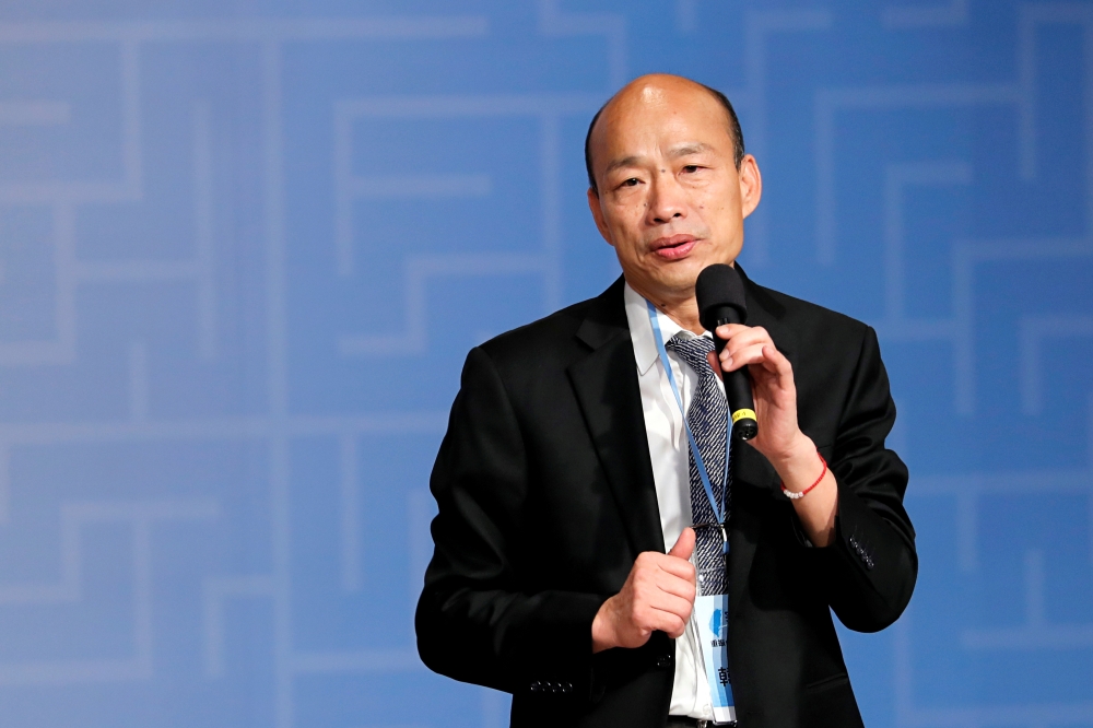 FILE PHOTO: Kaohsiung Mayor Han Kuo-yu speaks during a forum in Taipei, Taiwan, April 30, 2019. REUTERS/Tyrone Siu/File Photo