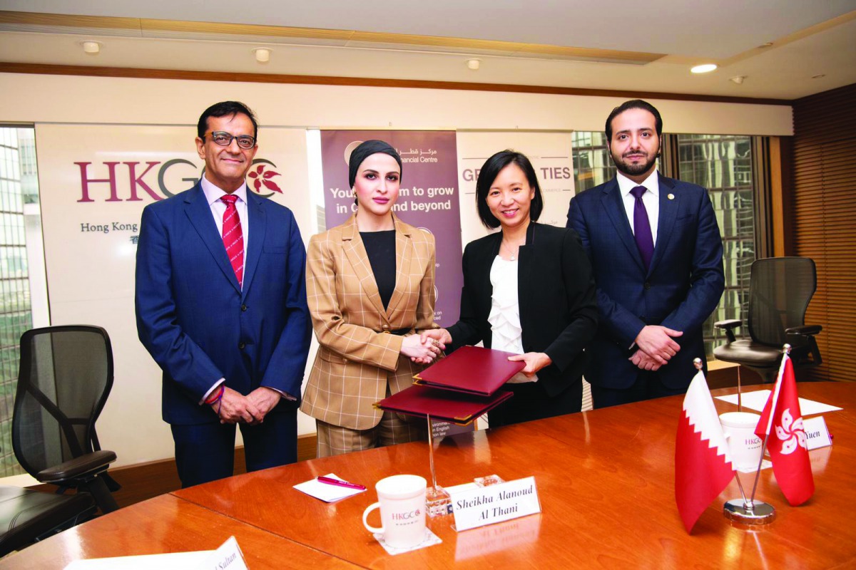 Sheikha Alanoud bint Hamad Al Thani (second left), Managing Director, Business Development, QFC; and other officials during the signing ceremony in Hong Kong.