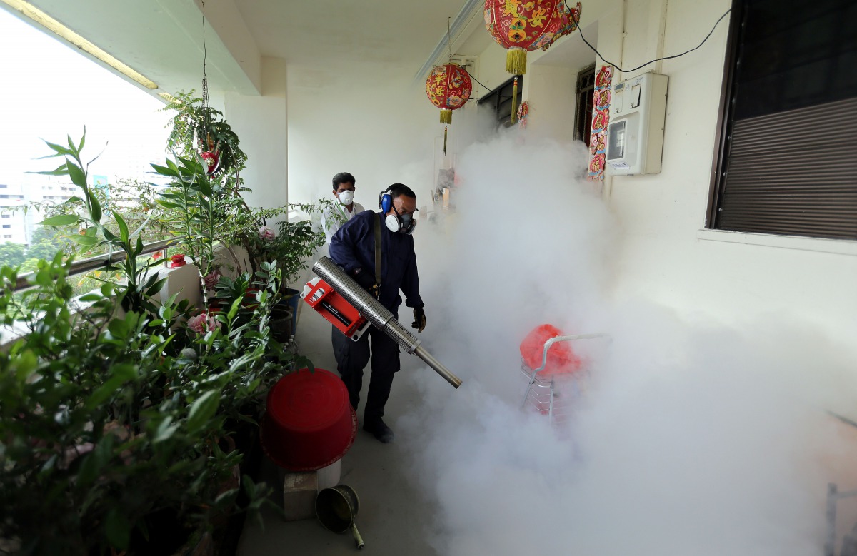Representative image: Workers fogging in the housing estate at Aljunied Crescent in Singapore as 40 more cases of locally transmitted Zika virus infections reported on August 28, 2016. AFP / Wong Kwai Chow