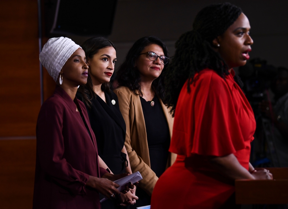US Representatives Ayanna Pressley (D-MA) speaks as, Ilhan Abdullahi Omar (D-MN)(L), Rashida Tlaib (D-MI) (2R), and Alexandria Ocasio-Cortez (D-NY) hold a press conference, to address remarks made by US President Donald Trump earlier in the day, at the US