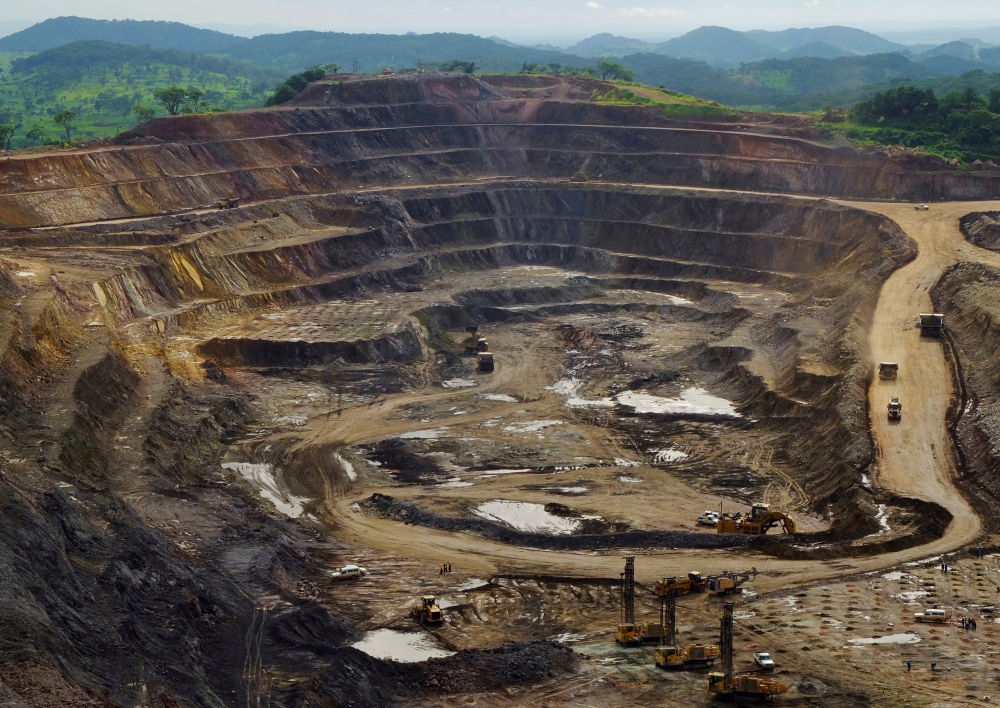 Excavators and drillers at work in an open pit at Tenke Fungurume, a copper and cobalt mine 110 km (68 miles) northwest of Lubumbashi in Congo's copper-producing south. January 29, 2013. Reuters/Jonny Hogg