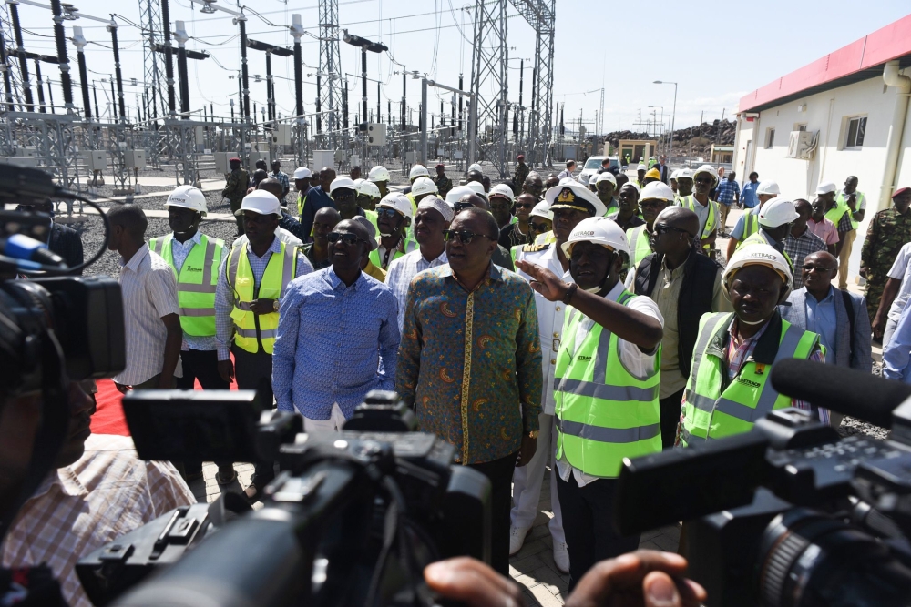 Kenyan President Uhuru Kenyatta inaugurates the 310 megawatt renewable energy project in Loiyangalani, Marsabit County, on July 19, 2019.  AFP / Nick Perry
 