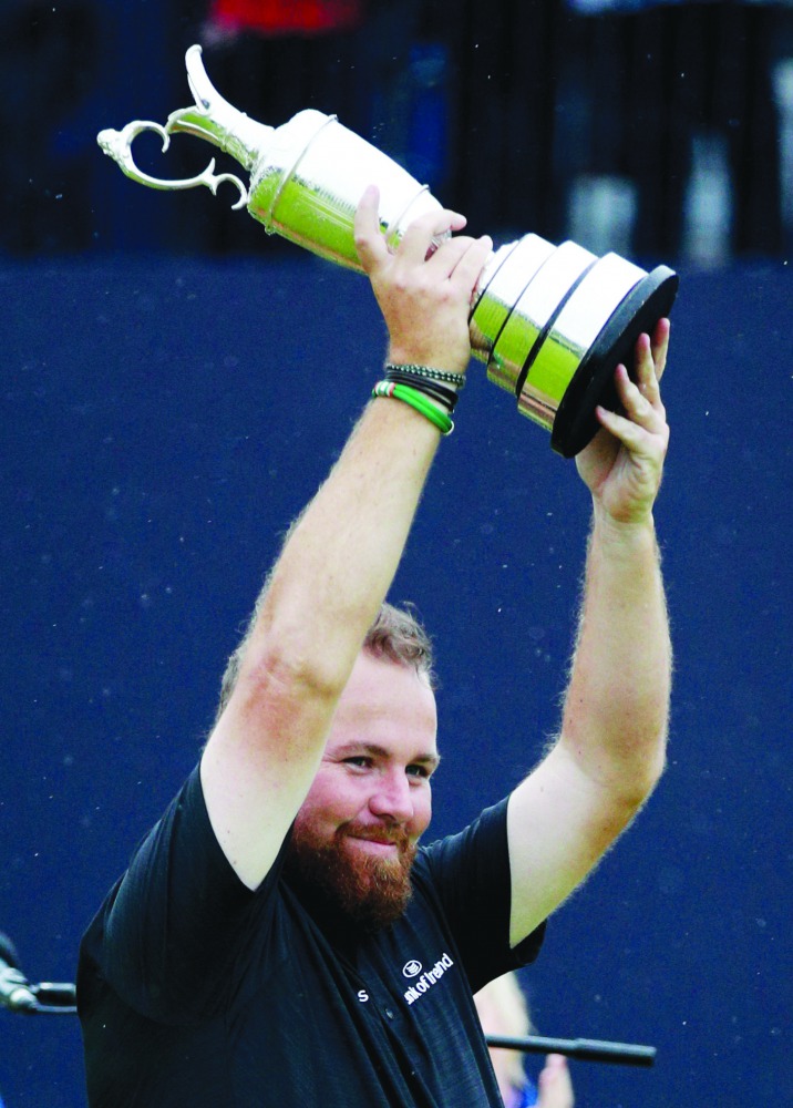 Republic of Ireland's Shane Lowry celebrates with the Claret Jug trophy after winning The Open Championship. Reuters/Ian Walton